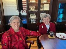 Marian Moore, unidentified visitor